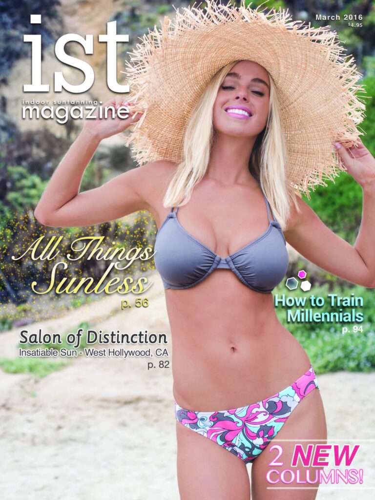 Blonde woman wearing a sun hat and swimsuit on the March 2016 cover of IST Magazine
