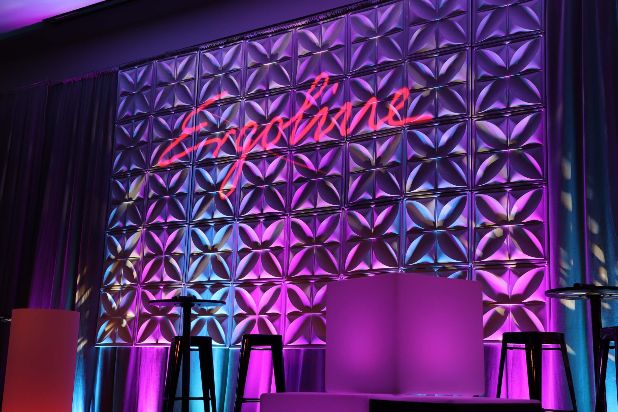 illuminated Ergoline branding wall design inside tanning salon